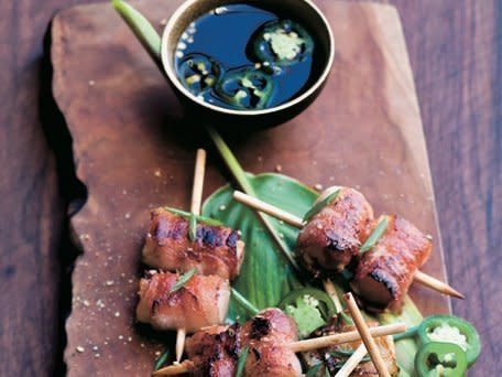 <strong>Get the <a href="http://www.huffingtonpost.com/2011/10/27/bacon-wrapped-rice-cakes-_n_1061463.html">Bacon-wrapped Rice Cakes with Jalapeño Ponzu</a> recipe</strong>