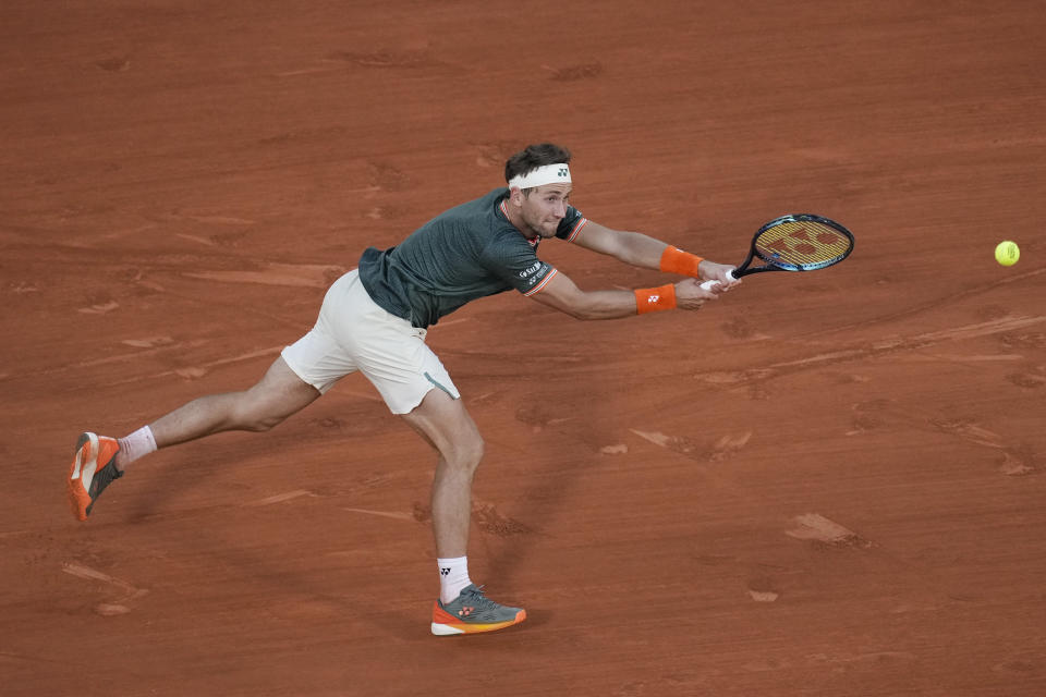 Norway's Casper Ruud plays a shot against Germany's Alexander Zverev during their semifinal match of the French Open tennis tournament at the Roland Garros stadium in Paris, Friday, June 7, 2024. (AP Photo/Christophe Ena)