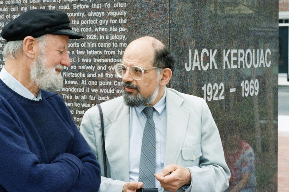 Lawrence Ferlinghetti (left) and Allen Ginsberg talk during the dedication of the Jack Kerouac Commemorative, a work of public art in Lowell, Mass., on June 25, 1988.  