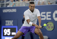 Nick Kyrgios, of Australia, returns a shot to Antoine Hoang, of France, during the second round of the US Open tennis championships Thursday, Aug. 29, 2019, in New York. (AP Photo/Charles Krupa)