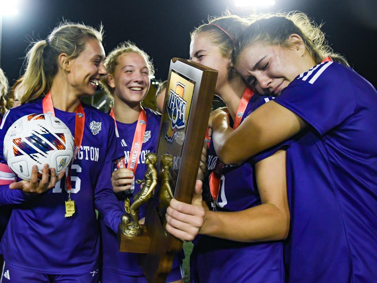 Bloomington South’s Keira Robinson (with ball), Valerie Bunde, Annalise Coyne and Izzy Sweet react after receiving the runner-up trophy after losing to Noblesville, 3-1, in the IHSAA girls’ soccer state championship match at Michael Carroll Track & Soccer Stadium in Indianapolis, Ind. on Saturday, Oct. 28, 2023.