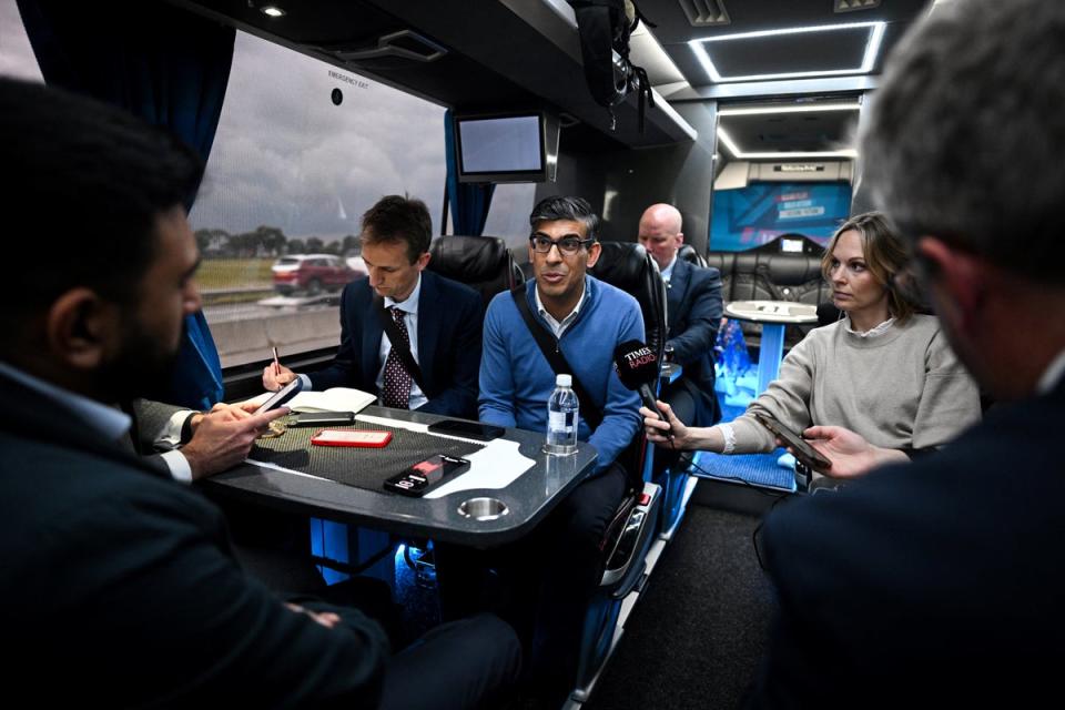 Rishi Sunak on his campaign bus (POOL/AFP via Getty Images)