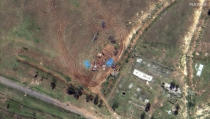 This satellite image provided by Maxar Technologies claims to show tanks positioned in the village of Serha in Eritrea, across the border from the town of Zalambessa in the Tigray region of northern Ethiopia on Monday, Sept. 19, 2022. New satellite imagery of one of the world's most reclusive nations shows military positions inside Eritrea near the border with Ethiopia's northern Tigray region, backing up witness accounts of a new, large-scale offensive. (Maxar Technologies via AP)