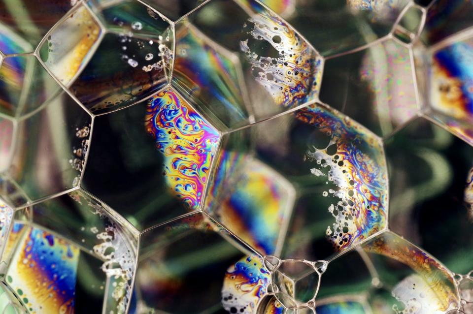 Math helps explain the shapes of bubbles and the reason they naturally pack together without any gaps. Adrienne Bresnahan/Moment via Getty Images