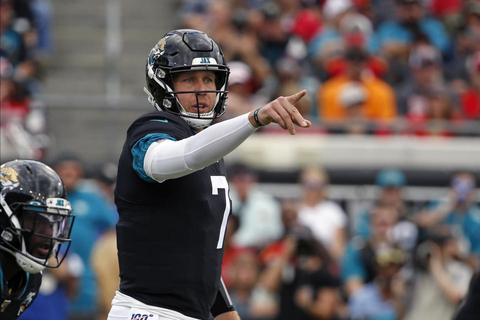 Jacksonville Jaguars quarterback Nick Foles directs signals against the Tampa Bay Buccaneers during the first half of an NFL football game, Sunday, Dec. 1, 2019, in Jacksonville, Fla. (AP Photo/Stephen B. Morton)