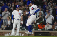 Chicago Cubs' Mike Tauchman homers during the eighth inning of a baseball game against the Houston Astros, Tuesday, April 23, 2024, in Chicago. (AP Photo/Erin Hooley)