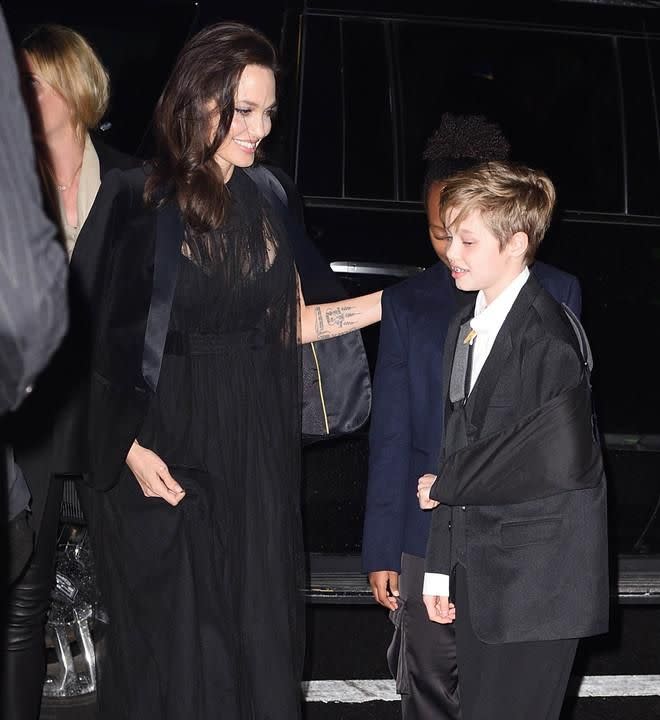 Angelina Jolie was spotted out with 11-year-old daughter Shiloh, who is nursing a broken arm, and 13-year-old Zahara in New York City. Source: Splash