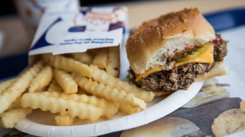 White Castle Slider with fries on paper plate