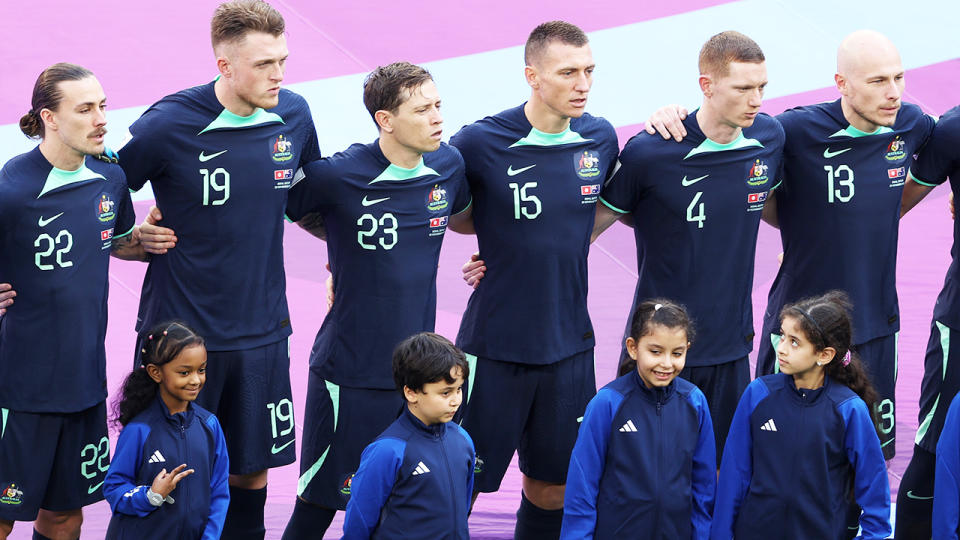 The Socceroos, pictured here wearing their away kits against Tunisia at the FIFA World Cup.