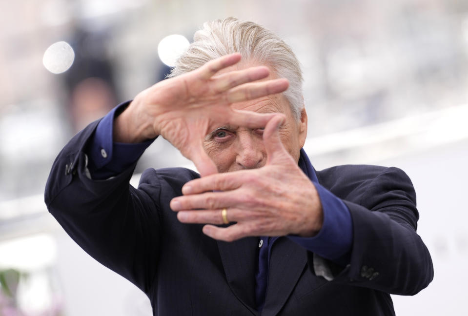 Michael Douglas poses for photographers at the photo call honoring him with a Palme d'Or at the 76th international film festival, Cannes, southern France, Tuesday, May 16, 2023. (Photo by Scott Garfitt/Invision/AP)