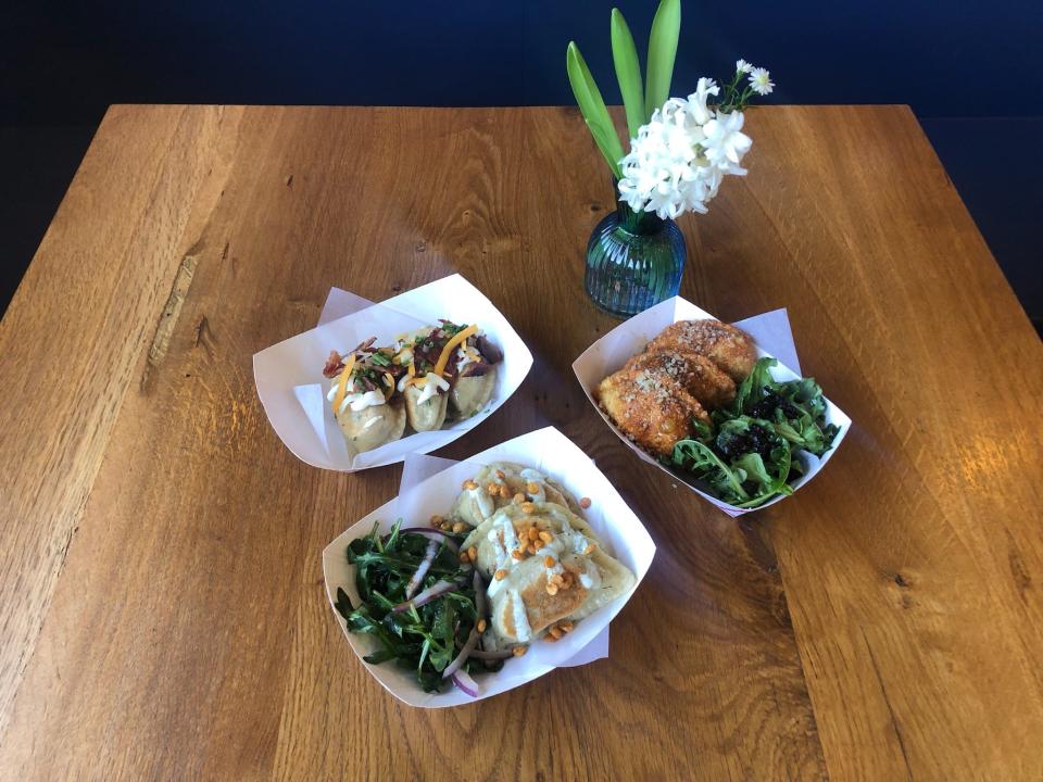 Hot Dish Pantry's pierogi include loaded baked potato (top left), aloo chaat (middle bottom), and pepperoni pizza roll (top right).