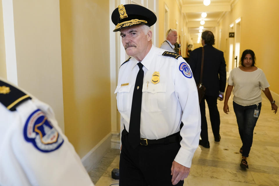 FILE - U.S. Capitol Police Chief J. Thomas Manger walks outside the room where the House select committee investigating the Jan. 6 attack on the U.S. Capitol will hold a hearing on June 9, 2022, in Washington. Paul Pelosi, the husband of House Speaker Nancy Pelosi, was attacked and severely beaten by an assailant with a hammer who broke into their San Francisco home early Friday, Oct. 28. Manger said in a weekend memo to lawmakers that the attack “is a somber reminder of the threats elected officials and families face in 2022.” (AP Photo/Andrew Harnik, File)