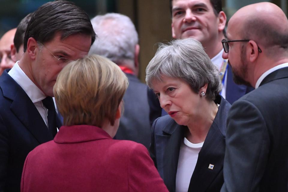 Britain’s Prime Minister Theresa May speaks with European leaders as she arrives to attend a European Summit aimed at discussing the Brexit deal, the long-term budget and the single market (Getty Images)