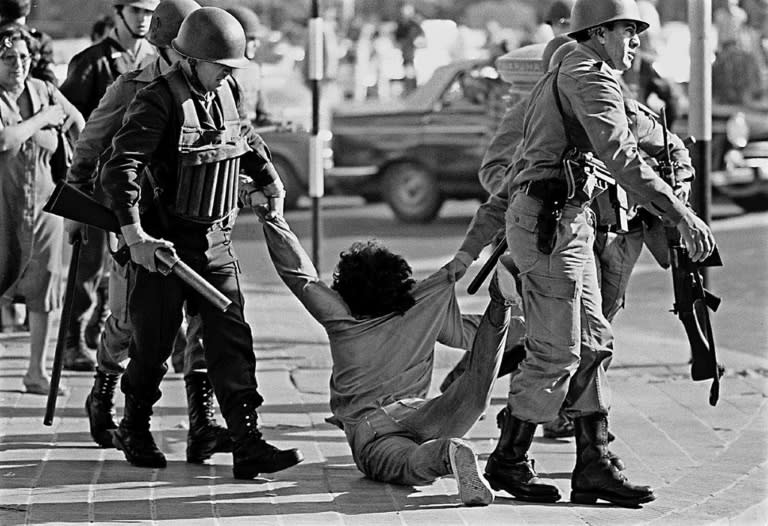 A worker being arrested during a protest against the Argentine dictatorship in Buenos Aires on March 30, 1982