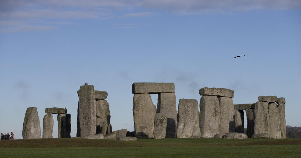 The world heritage site of Stonehenge, England, Tuesday, Dec. 17, 2013. It has been standing for thousands of years, so Britain's ancient Stonehenge monument was due a makeover. The 27 million pound ($44 million) renovation which was previewed Tuesday includes a new building 1.5 miles (2.4 kilometers) from the stones where the 1 million a year visitors can watch an exhibition about Neolithic life. (AP Photo/Alastair Grant)