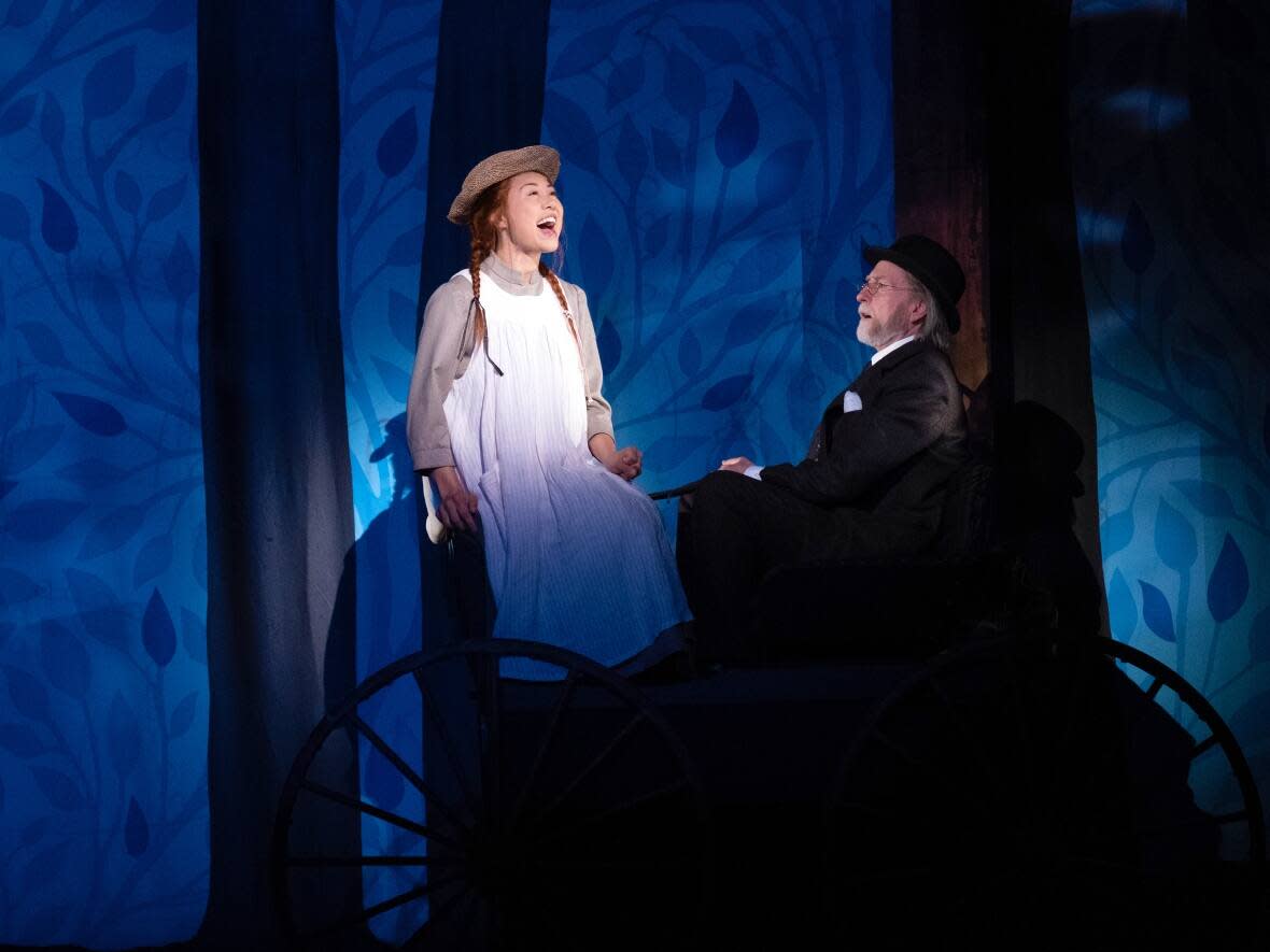 Kelsey Verzotti as Anne with Laurie Murdoch in the 2022 Charlottetown Festival production of Anne of Green Gables — The Musical.  (Louise Vessey/Charlottetown Festival - image credit)