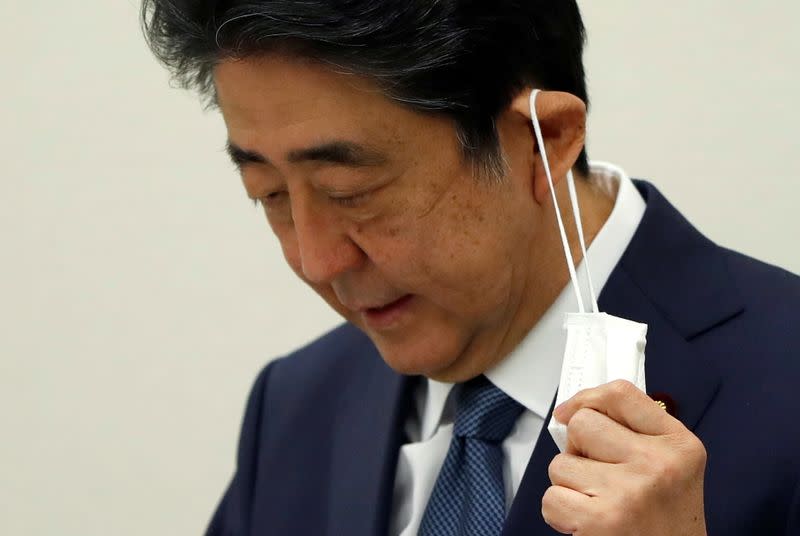 Former Japanese PM Shinzo Abe holds a news conference in Tokyo