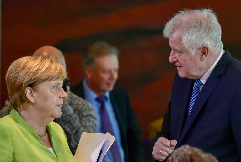 A truce within German Chancellor Angela Merkel's conservative camp has shattered with her hardline interior minister Horst Seehofer defending protests marred by neo-Nazi violence and blasting migration as "the mother of all political problems"