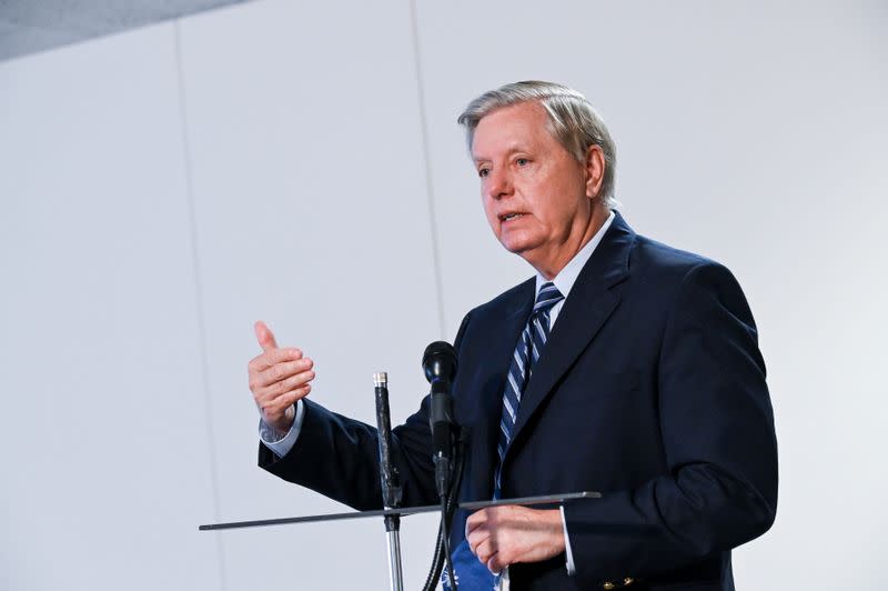 speaks to reporters after a luncheon on Capitol Hill in Washington