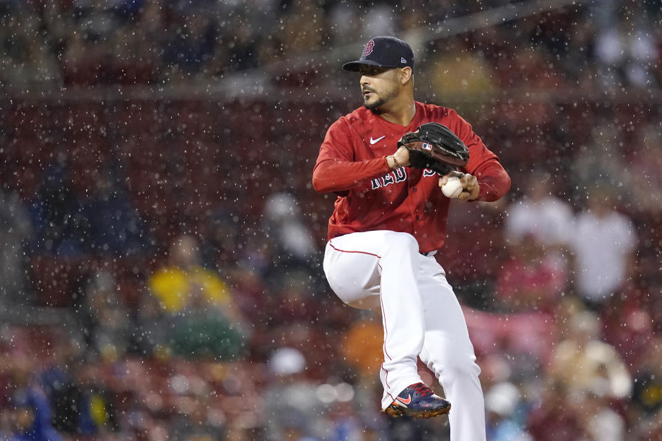 Boston Red Sox starting pitcher Martin Perez winds up during the fifth inning of the team's baseball game against the Kansas City Royals at Fenway Park, Wednesday, June 30, 2021, in Boston. (AP Photo/Elise Amendola)