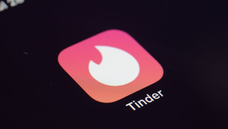 The icon for the dating app Tinder appears on a device in 2020, in New York. Tinder, Hinge and other dating apps are part of a lawsuit against parent company Match Group.