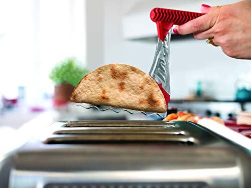 <p><strong>THE ORIGINAL TACO TOASTER</strong></p><p>amazon.com</p><p><strong>$19.95</strong></p><p><a href="https://www.amazon.com/dp/B081K8F7W2?tag=syn-yahoo-20&ascsubtag=%5Bartid%7C10055.g.28649116%5Bsrc%7Cyahoo-us" rel="nofollow noopener" target="_blank" data-ylk="slk:Shop Now;elm:context_link;itc:0;sec:content-canvas" class="link ">Shop Now</a></p><p>Just what every taco and burrito lover needs: A tool made to toast two corn or wheat tortillas at a time in your toaster. </p>