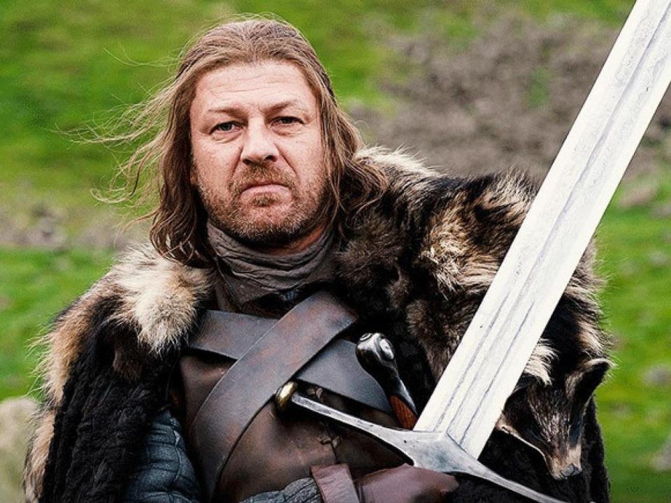 Sean Bean holding a sword