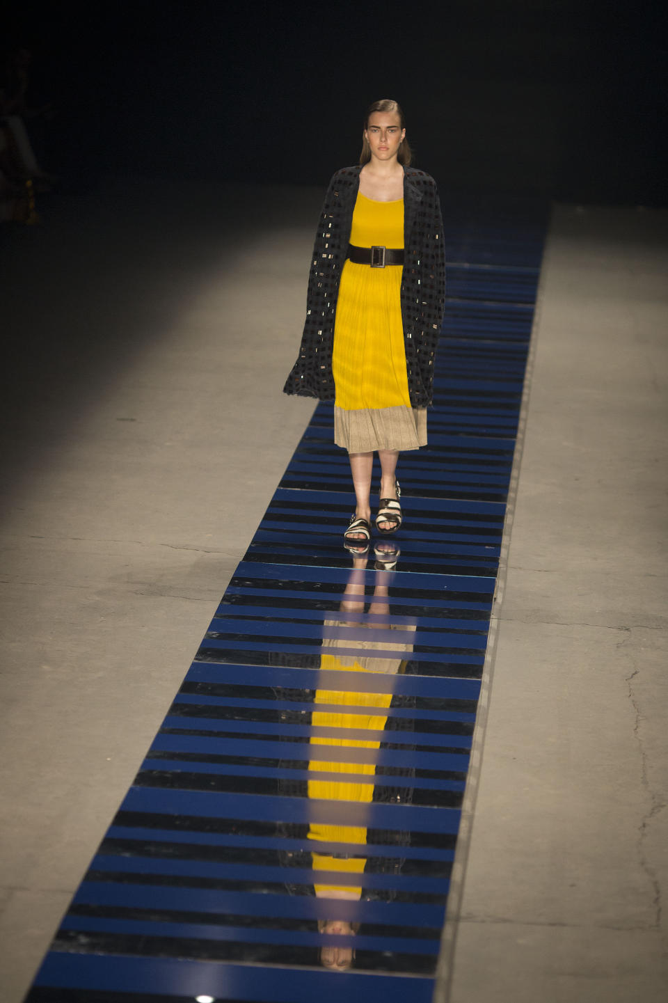 A model wears a creation from the Coven winter collection during Fashion Rio in Rio de Janeiro, Brazil, Friday, Nov. 8, 2013. (AP Photo/Felipe Dana)