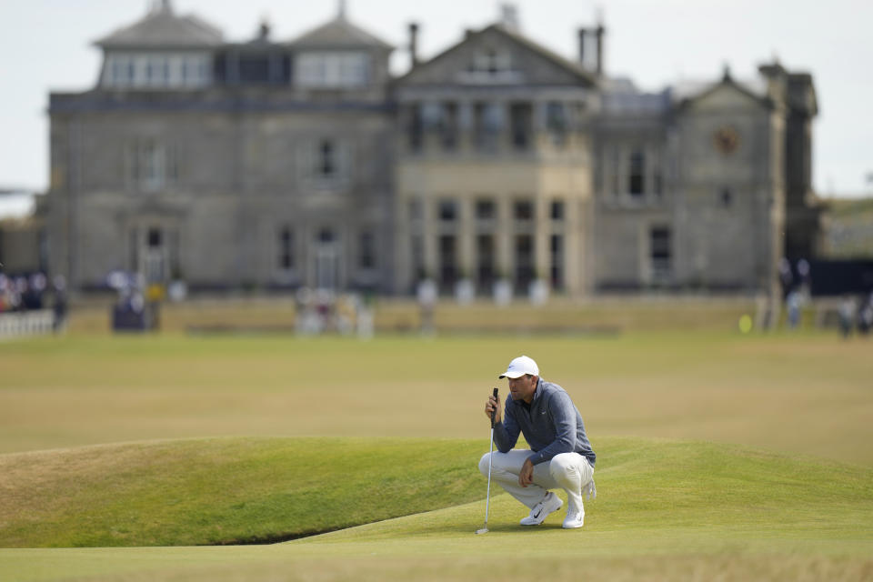 Scottie Scheffler of the US lines up a putt on the 17th green during the second round of the British Open golf championship on the Old Course at St. Andrews, Scotland, Friday July 15, 2022. The Open Championship returns to the home of golf on July 14-17, 2022, to celebrate the 150th edition of the sport's oldest championship, which dates to 1860 and was first played at St. Andrews in 1873. (AP Photo/Alastair Grant)