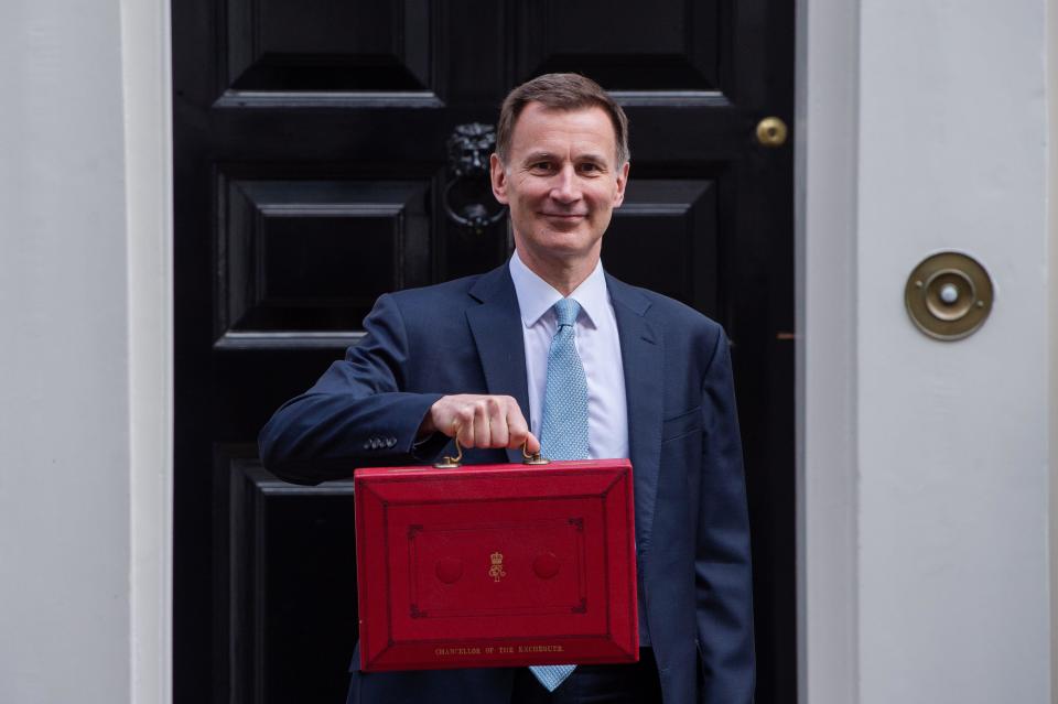 lifetime allowance Chancellor of the Exchequer Jeremy Hunt presents the Spring Budget with the iconic 'Red Box' Outside 11 Downing Street.