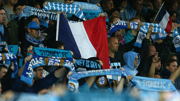 A French flag in the crowd at Sydney FC's match against Melbourne Victory at Allianz Stadium.