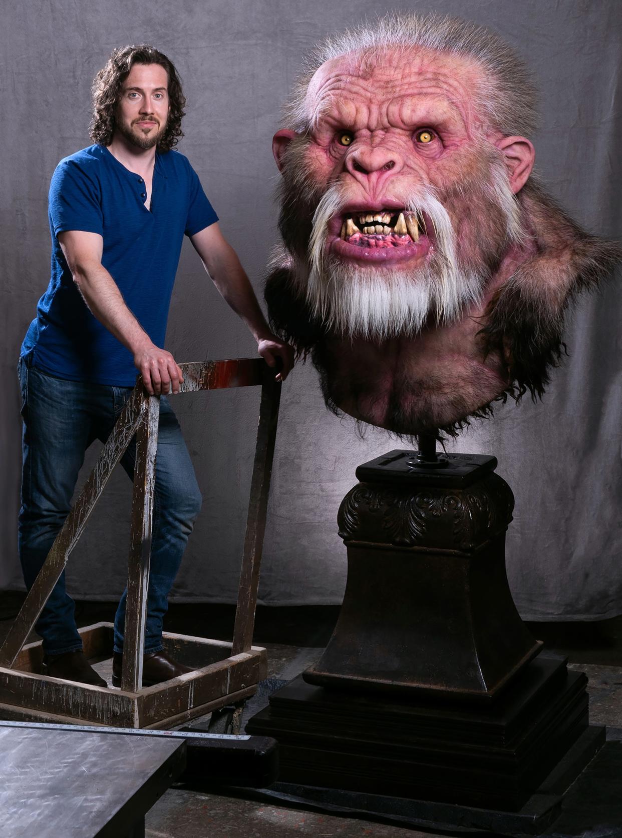 Artist Dan Chudzinski is pictured with the Bigfoot sculpture he created that will be on display at the Hayes Presidential Library and Museums.