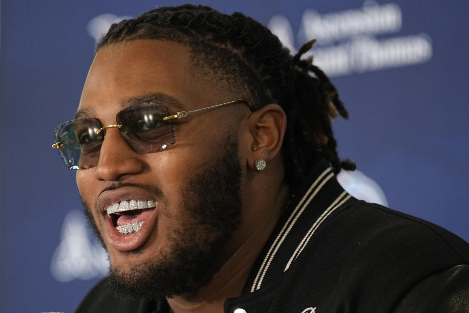 Tennessee Titans first-round draft pick JC Latham speaks during an NFL football news conference Friday, April 26, 2024, in Nashville, Tenn. (AP Photo/George Walker IV)