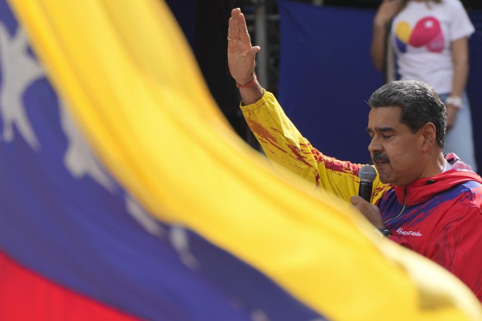 FILE - Venezuelan President Nicolas Maduro speaks to supporters at an event commemorating a 2004 speech by late President Hugo Chavez that is considered a key anti-imperialist moment by his supporters in the history of his Bolivarian Revolution, in Caracas, Venezuela, Feb 29, 2024. Maduro became interim president in March 2013 after the death of leader Hugo Chávez. He narrowly won election a few months later and was re-elected in 2018. He is seeking a third six-year term in the upcoming elections in July. (AP Photo/Ariana Cubillos, File)