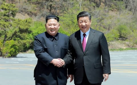 Kim Jong-un and Xi Jinping, the Chinese president, have rekindled their political relationship - Credit: KCNA/AFP