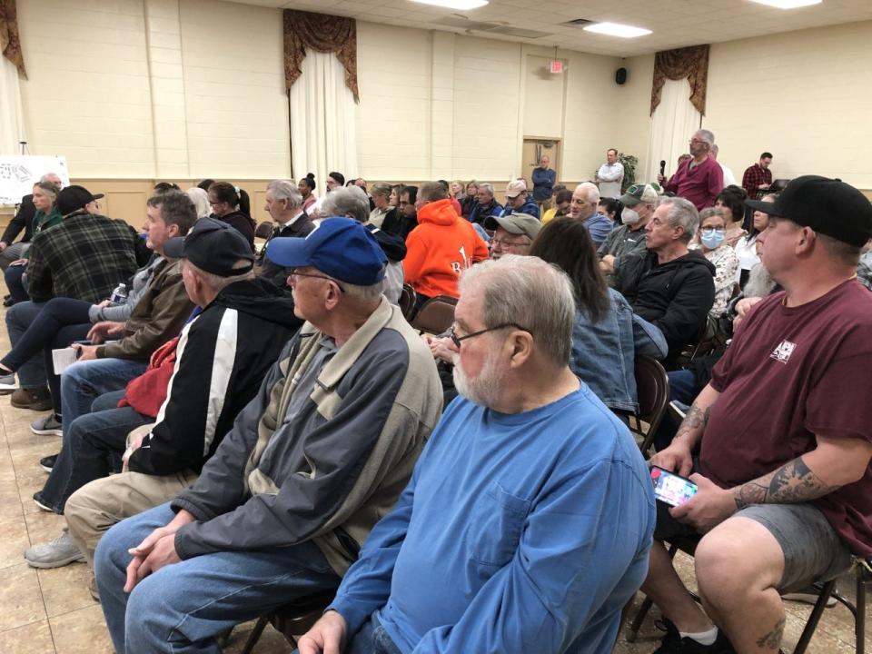 Dozens of Hulmeville residents turn out for a meeting Wednesday evening of the Hulmeville Planning Commission to hear their comments on a proposed housing development on the hill overlooking town.