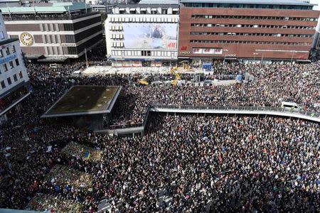 People gather in Sergels torg in central Stockholm for a "Lovefest" vigil against terrorism following Friday's attack, April 9, 2017. TT NEWS AGENCY/Maja Suslin via REUTERS