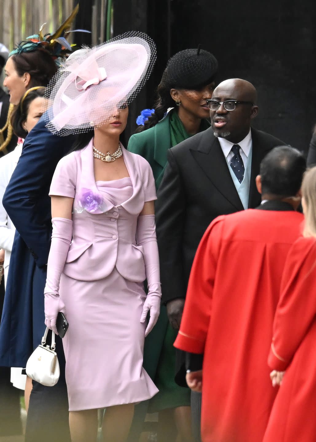 london, england may 06 katy perry and edward enninful arrive at westminster abbey ahead of the coronation of king charles iii and queen camilla on may 06, 2023 in london, england the coronation of charles iii and his wife, camilla, as king and queen of the united kingdom of great britain and northern ireland, and the other commonwealth realms takes place at westminster abbey today charles acceded to the throne on 8 september 2022, upon the death of his mother, elizabeth ii photo by jeff spicergetty images