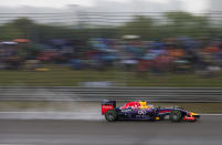 Red Bull Racing driver Sebastian Vettel of Germany drives during the qualifying session of the Chinese Formula One Grand Prix at Shanghai International Circuit in Shanghai, China Saturday, April 19, 2014. (AP Photo/Andy Wong)