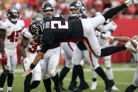 Atlanta Falcons quarterback Matt Ryan (2) dives over on a two-point conversion during the second half of an NFL football game against the Tampa Bay Buccaneer Sunday, Sept. 19, 2021, in Tampa, Fla. (AP Photo/Mark LoMoglio)