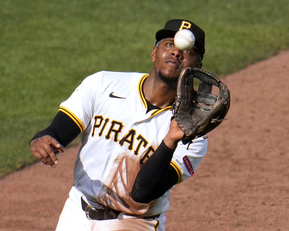 Pittsburgh Pirates third base Ke'Bryan Hayes catches a bunt attempted by New York Mets' Tyrone Taylor during the sixth inning of a baseball game in Pittsburgh, Saturday, July 6, 2024. (AP Photo/Gene J. Puskar)