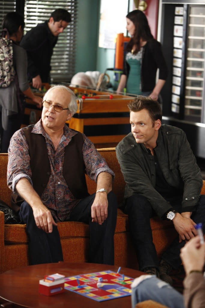 “The feeling is mutual about your attitude” Joel McHale (right) said about Chevy Chase. ©NBC/Courtesy Everett Collection