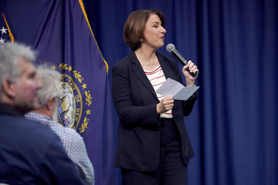 Democratic presidential candidate Sen. Amy Klobuchar, D-Minn., responds to a question she pulled from a bucket during a campaign stop, Friday, Nov. 22, 2019, in Henniker, N.H. (AP Photo/Mary Schwalm)
