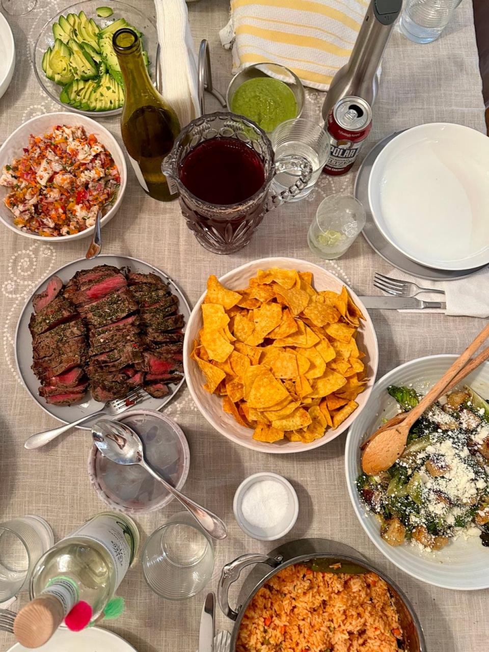 PHOTO: An array of dishes from 'Asada: The Art of Mexican-Style Grilling,' on a dining table for a cookbook club in New York City. (Kelly McCarthy)