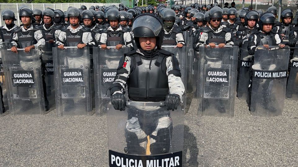 Members of the Mexican National Guard stand on the border between Mexico and Guatemala to prevent the crossing of migrant caravans on October 21, 2022. - Stringer/AFP/Getty Images