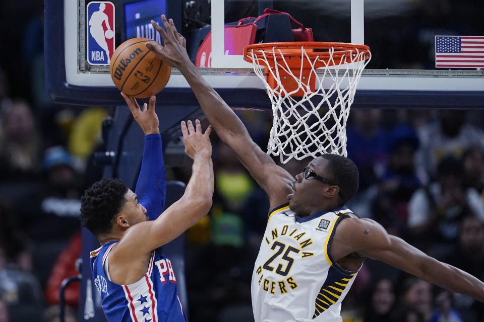 Philadelphia 76ers' KJ Martin (1) shoots against Indiana Pacers' Jalen Smith (25) during the second half of an NBA basketball game Thursday, Jan. 25, 2024, in Indianapolis. (AP Photo/Darron Cummings)