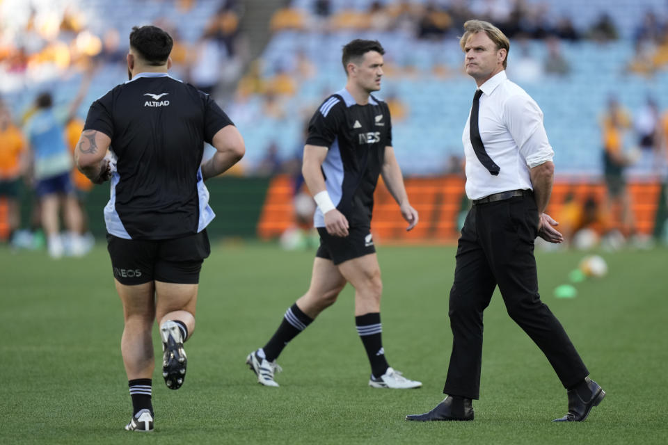 New Zealand's head coach Scott Robertson watches his team warm up before playing Australia in their rugby union test match in Sydney, Saturday, Sept. 21, 2024. (AP Photo/Rick Rycroft)