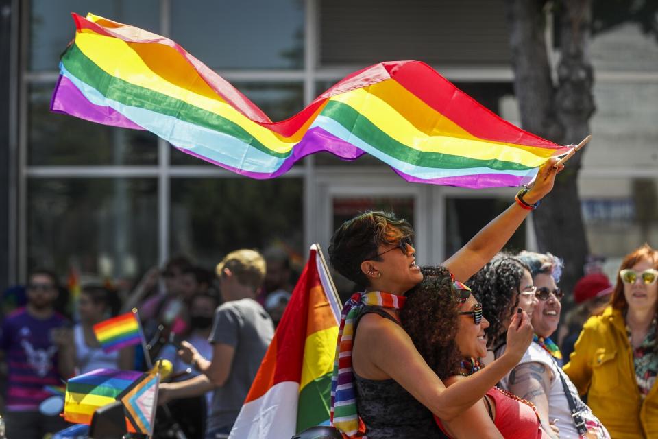 Thousands gather along Hollywood Blvd at the 2022 LA Pride Parade.