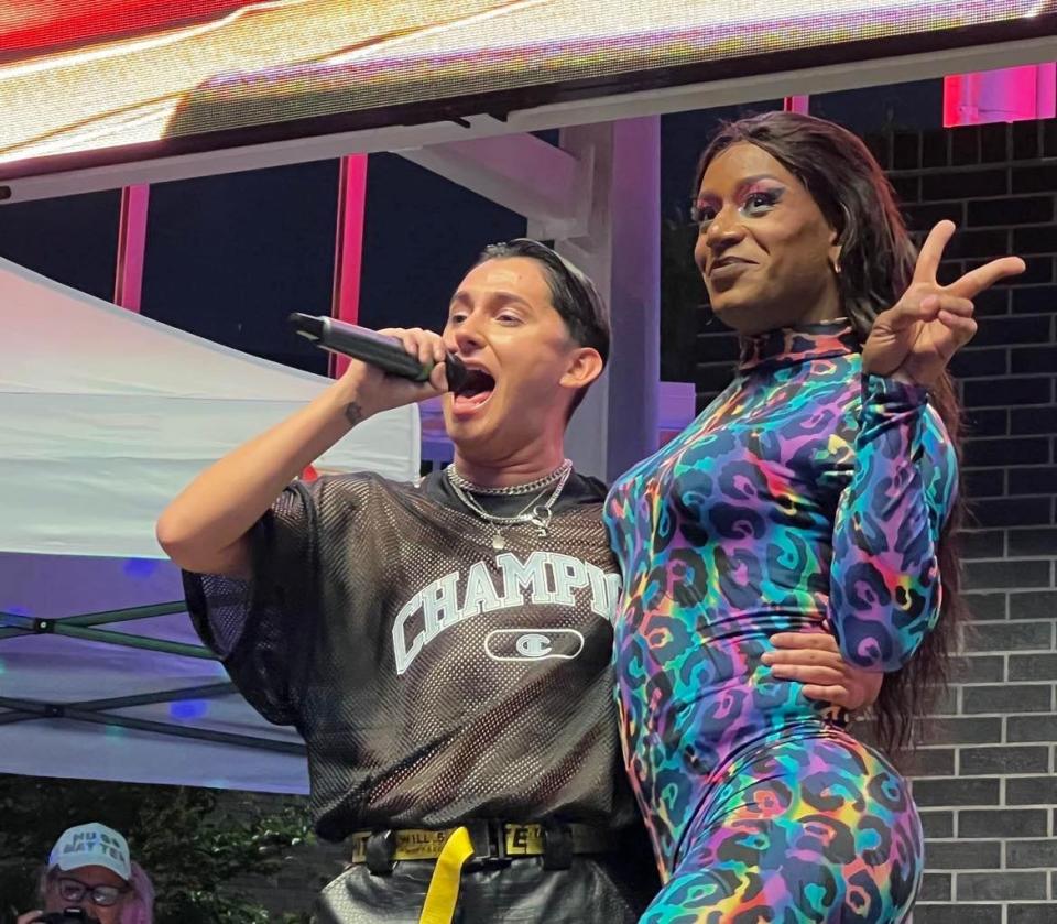 Hip-hop artist Ethan Soza and Kardi Redd Diamond address the crowd on stage at the Stark Pride Festival last summer. Kardi is a drag artist from Canton and well known as a performer in Northeast Ohio.