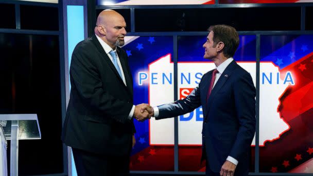 PHOTO: A handout photo made available by abc27 shows Democratic candidate Lt. Gov. John Fetterman (L) and Republican Pennsylvania Senate candidate Dr. Mehmet Oz (R) shaking hands prior to their debate in Harrisburg, Penn., Oct. 25, 2022. (Greg Nash, Handout via EPA via Shutterstock)